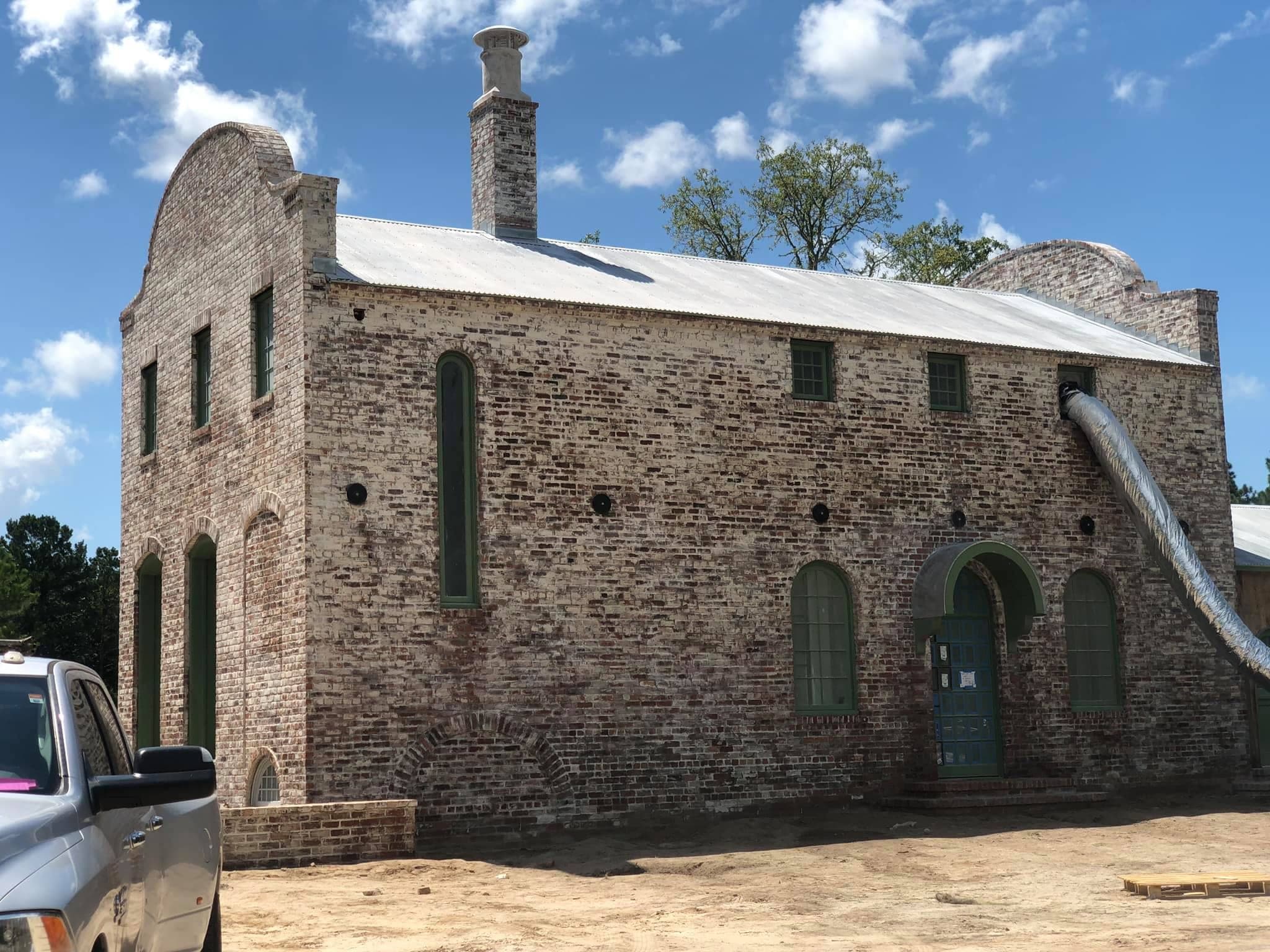 Breathable lime wash finish on exterior masonry by Lazar Stucco — project 11